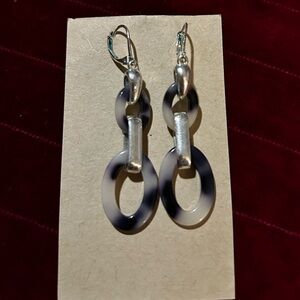 Classic silvertoned black/white tortoise shell print Earrings.